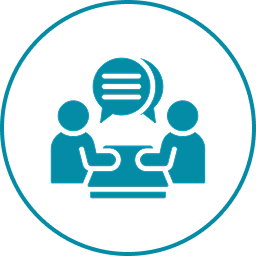 Icon of two people, possibly biotech industry experts, sitting at a table having a conversation, with a speech bubble overhead.